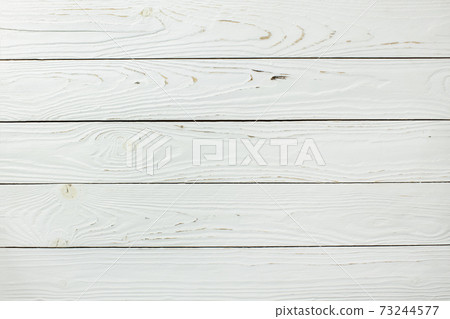 Wooden decorative background with copy space. White larch board with knots and holes, abstract texture. Empty template. Concept of natural materials for home decoration. Horizontal mockup 73244577
