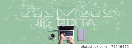 Email concept with person working with laptop 73246373