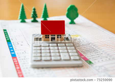 Home, calculator and tax return 73250090