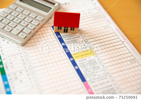 Home, calculator and tax return 73250091