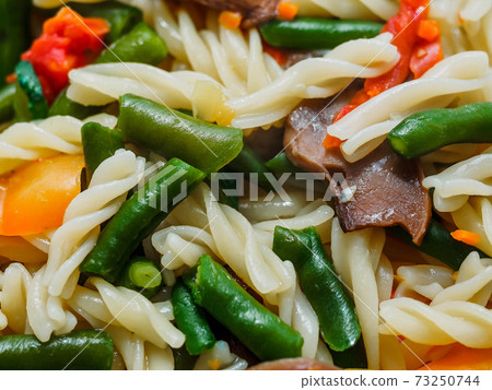 fusilli pasta with vegetables and mushrooms fusilli pasta with vegetables and mushrooms 73250744