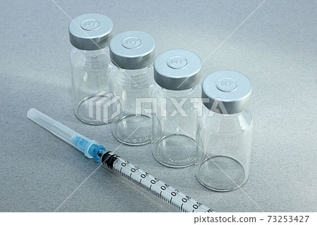 [Thumbnails of vaccination / vaccine related articles] Vaccine vials and syringes 73253427