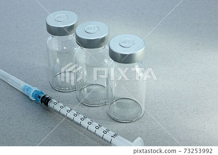 [Thumbnails of vaccination / vaccine related articles] Vaccine vials and syringes 73253992