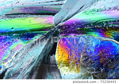 Color by the polarizing prism effect that penetrates the thin ice of sunlight 73256443