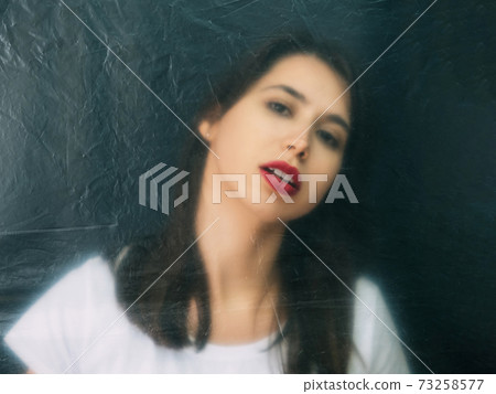 beauty care defocused portrait woman face red lips 73258577