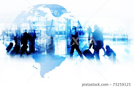 Silhouettes of business people walking  against a modern cityscape or airport . Toned image double exposure 73259125