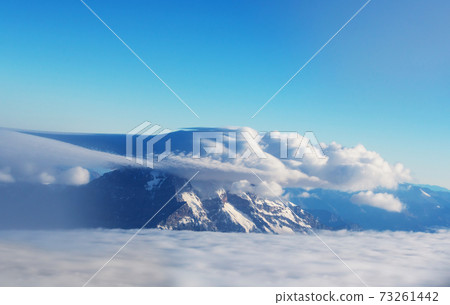 Mountains in clouds Mountains in clouds 73261442