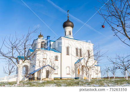 Winter Landscape with Orthodox Church against the Sky 73263350
