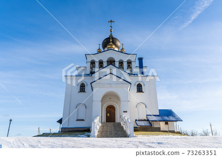 Winter Landscape with Orthodox Church against the Sky Winter Landscape with Orthodox Church against the Sky 73263351