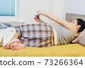 Woman wake up after relaxing 73266364