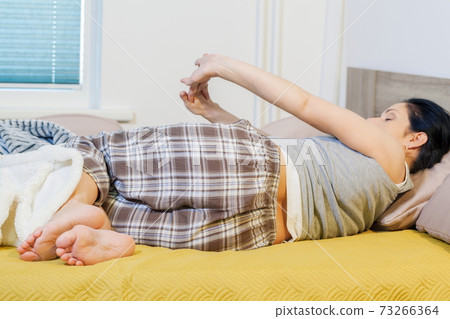 Woman wake up after relaxing Woman wake up after relaxing 73266364