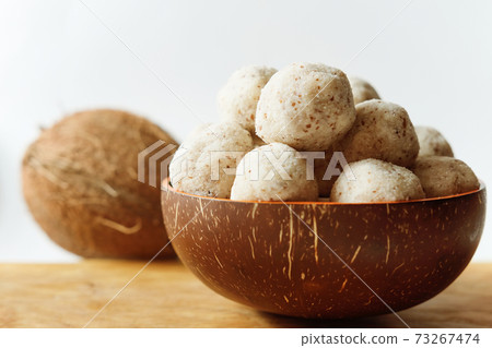 coconut energy balls with almond. healthy sugar free concept. keto diet recipe. 73267474