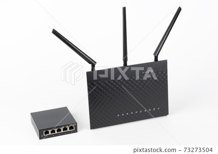 5-port gigabit desktop switch and dual-band gigabit Wi-Fi router. Components to create a fast computer network 5-port gigabit desktop switch and dual-band gigabit Wi-Fi router. Components to create a fast computer network 73273504