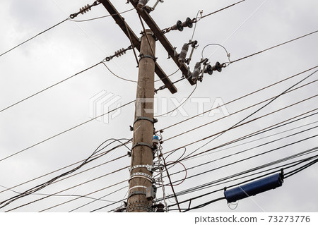 Concrete pole with high voltage wire Concrete pole with high voltage wire 73273776