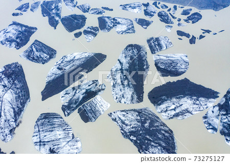 Aerial view of floating icebergs, Svinafelsjokull, Iceland Aerial view of floating icebergs, Svinafelsjokull, Iceland 73275127