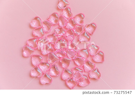 St. Valentine's Day concept. Many pink hearts isolated on pink pastel background. Postcard banner on valentines day. Love date lovesick wedding romance symbol. Top view, flat lay St. Valentine's Day concept. Many pink hearts isolated on pink pastel background. Postcard banner on valentines day. Love date lovesick wedding romance symbol. Top view, flat lay 73275547