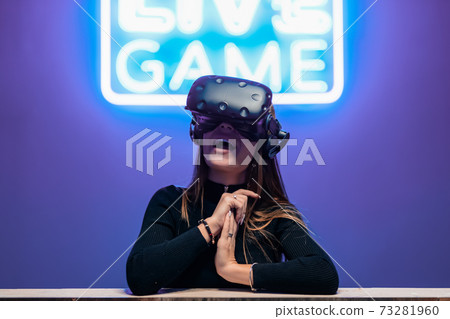 A woman gets pleasure through virtual reality. A woman gets pleasure through virtual reality. 73281960