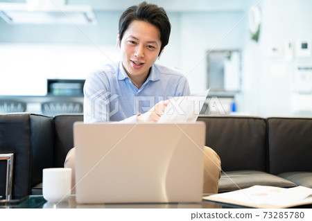 Men having an online meeting with remote work Men having an online meeting with remote work 73285780