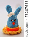 Knitted colored soft toy 73287633