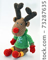 Knitted colored soft toy 73287635