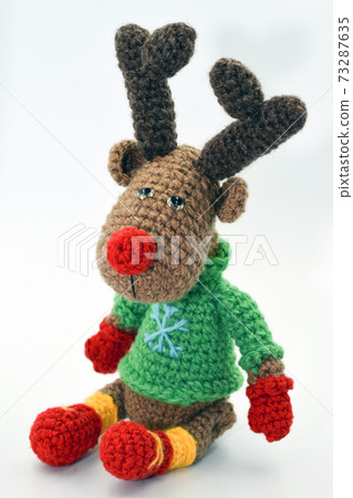 Knitted colored soft toy Knitted colored soft toy 73287635
