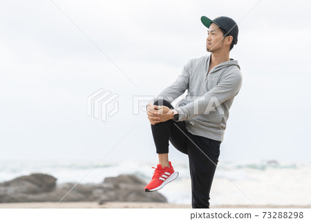 A man stretching A man stretching 73288298