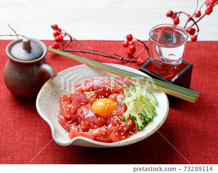 Yukhoe of lean bluefin tuna. Tuna cut into strips, entwined with soy sauce, gochujang + sake + sesame oil sauce. Yukhoe of lean bluefin tuna. Tuna cut into strips, entwined with soy sauce, gochujang + sake + sesame oil sauce. 73289114