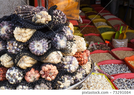 Various types of corn sold in the Peruvian market in South America 73291084