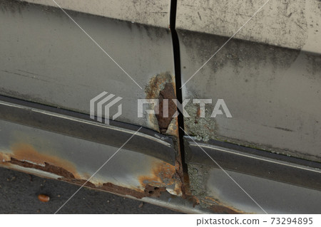 Steel plate with rust. Old car body 73294895