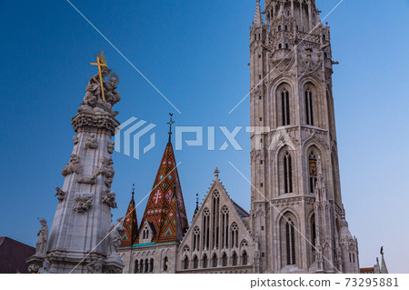 Statue of the Trinity with Matthias Church in Budapest, Hungary Statue of the Trinity with Matthias Church in Budapest, Hungary 73295881