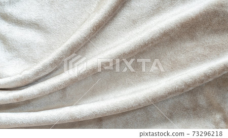 Beige velvet background or velour flannel texture made of cotton or wool with soft fluffy velvety satin fabric cloth metallic color material 73296218