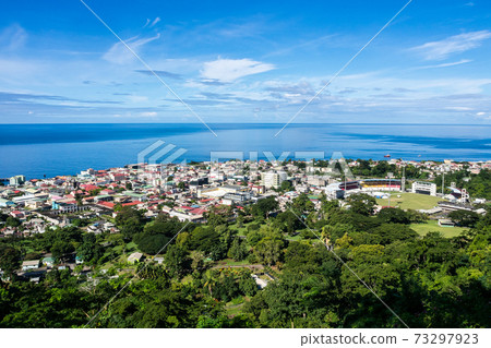 Scenic view of Roseau town and sea, Dominica island. Seen from the small mountain Morne Bruce 73297923