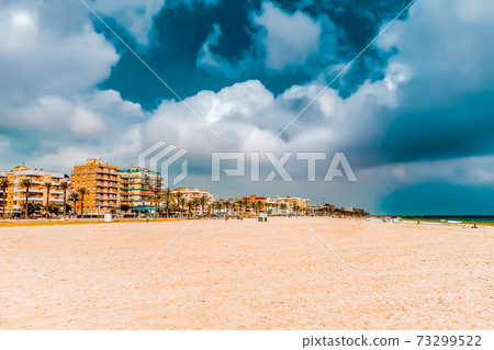 Seafront, beach,coast in Spain. Suburb of Barcelona, Catalonia Seafront, beach,coast in Spain. Suburb of Barcelona, Catalonia 73299522