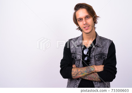 Portrait of happy young handsome rebellious man Portrait of happy young handsome rebellious man 73300603