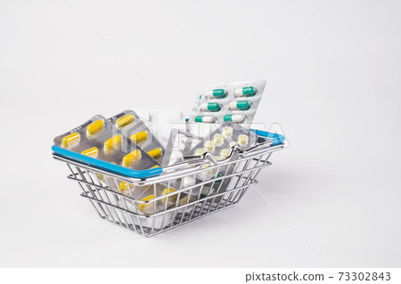 medicine blister in basket drug store sale customer on white background 73302843