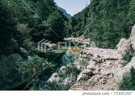 Landscape of green mountains in sadernes, catalonia Landscape of green mountains in sadernes, catalonia 73305207