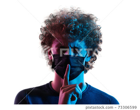 young man headshot face mask hushing silence portrait shadow white background young man headshot face mask hushing silence portrait shadow white background 73306599