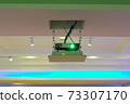 Projector installed on the ceiling of hotel conference room. 73307170