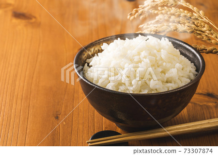 Freshly cooked rice in a bowl Freshly cooked rice in a bowl 73307874