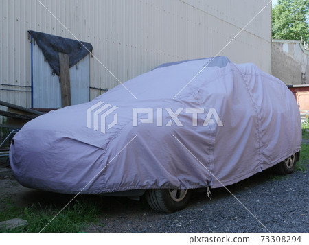 car covered with a cover 73308294