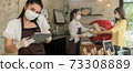 Panorama Waitress with face mask take order for curbside pick up and takeout. 73308889
