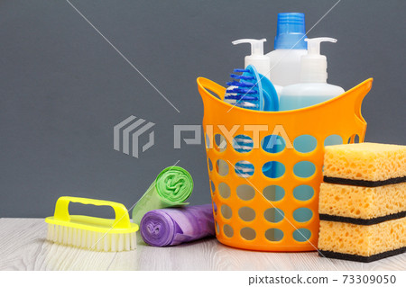Bottles of dishwashing liquid, brush in a basket and sponges, brush, garbage bags. Bottles of dishwashing liquid, brush in a basket and sponges, brush, garbage bags. 73309050