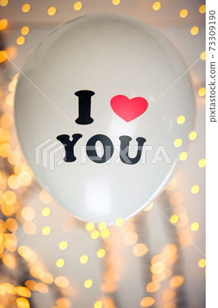 White balloon with I love you written on with sparkling bokeh background, Valentine's day concept design 73309190