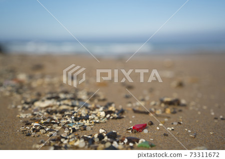 Plastic waste and micro plastic washed on the shore of the atlantic ocean Plastic waste and micro plastic washed on the shore of the atlantic ocean 73311672