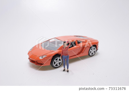 a mini girl take a self portrait with car 73311676