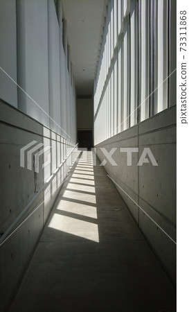Light and shadow corridor 73311868
