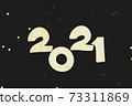 Wooden numbers 2021 on a black background. 73311869