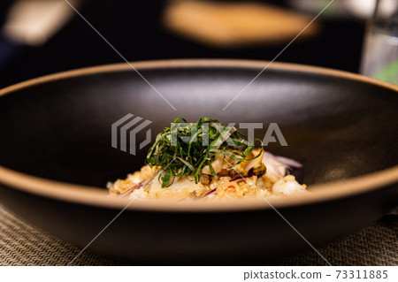 Seafood fried rice with shrimp, squid, abalone and vegetables 73311885