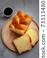 Brioche is a bread of French origin that is similar to a highly enriched pastry, and whose high egg and butter content gives it a rich and tender crumb 73313480