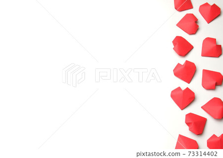 Composition from several handmade 3D red paper hearts on white background isolated. Love, Valentine's, mother's, women's day, relations, wedding, romantic template copy space Composition from several handmade 3D red paper hearts on white background isolated. Love, Valentine's, mother's, women's day, relations, wedding, romantic template copy space 73314402